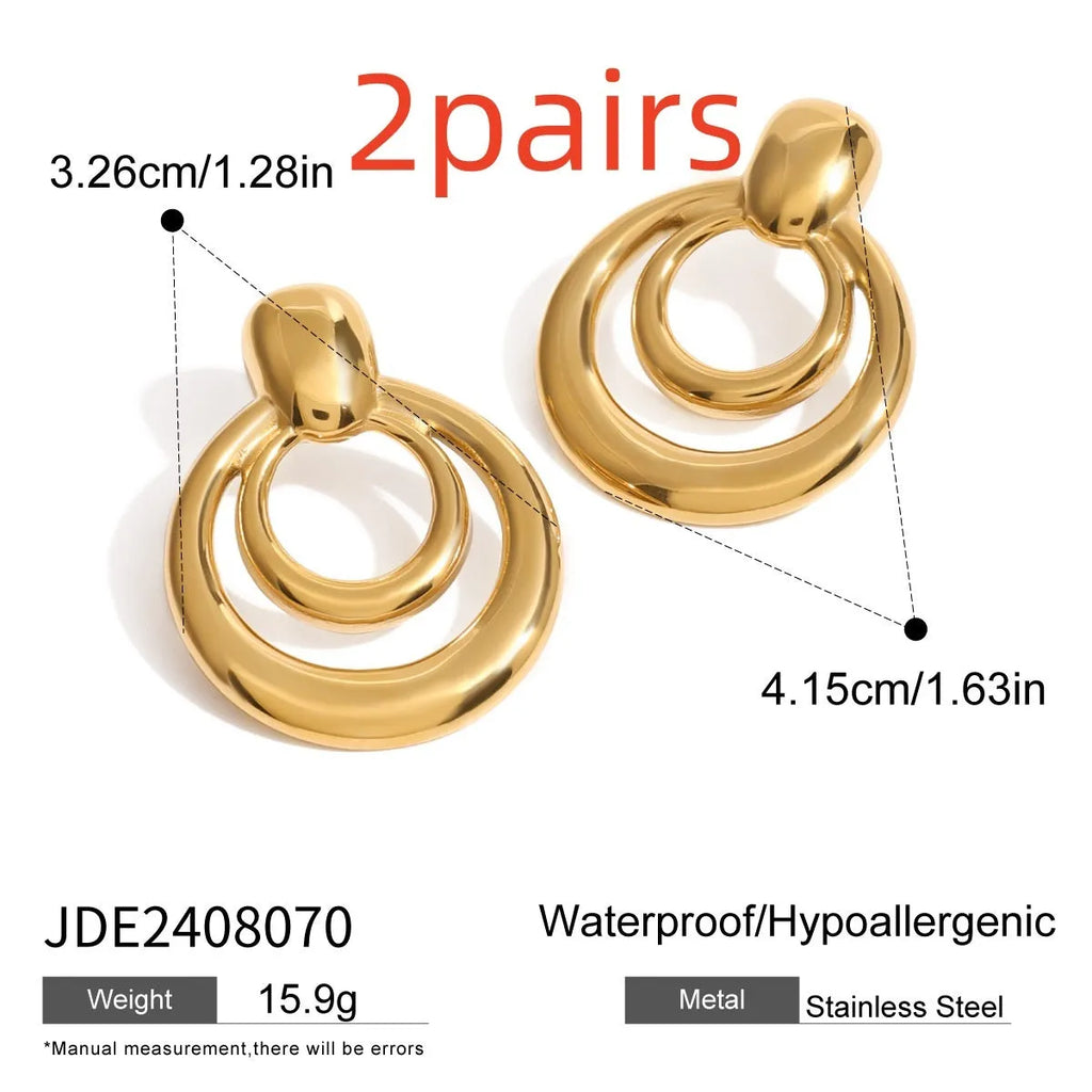 Golden double layer hollow stud earrings with geometric round shape and 18K gold electroplated finish