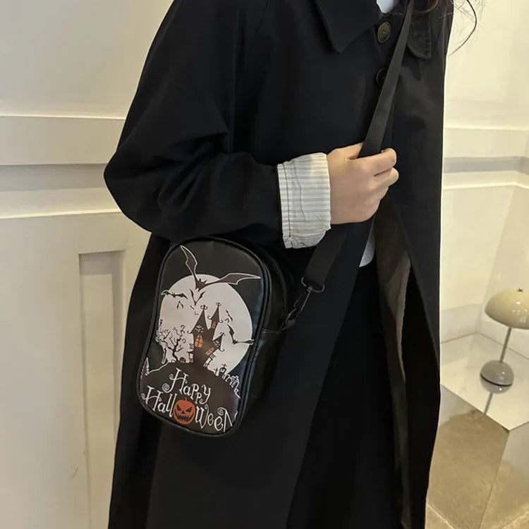 Halloween graffiti crossbody phone bag with pumpkin ghost bat prints in multiple colours
