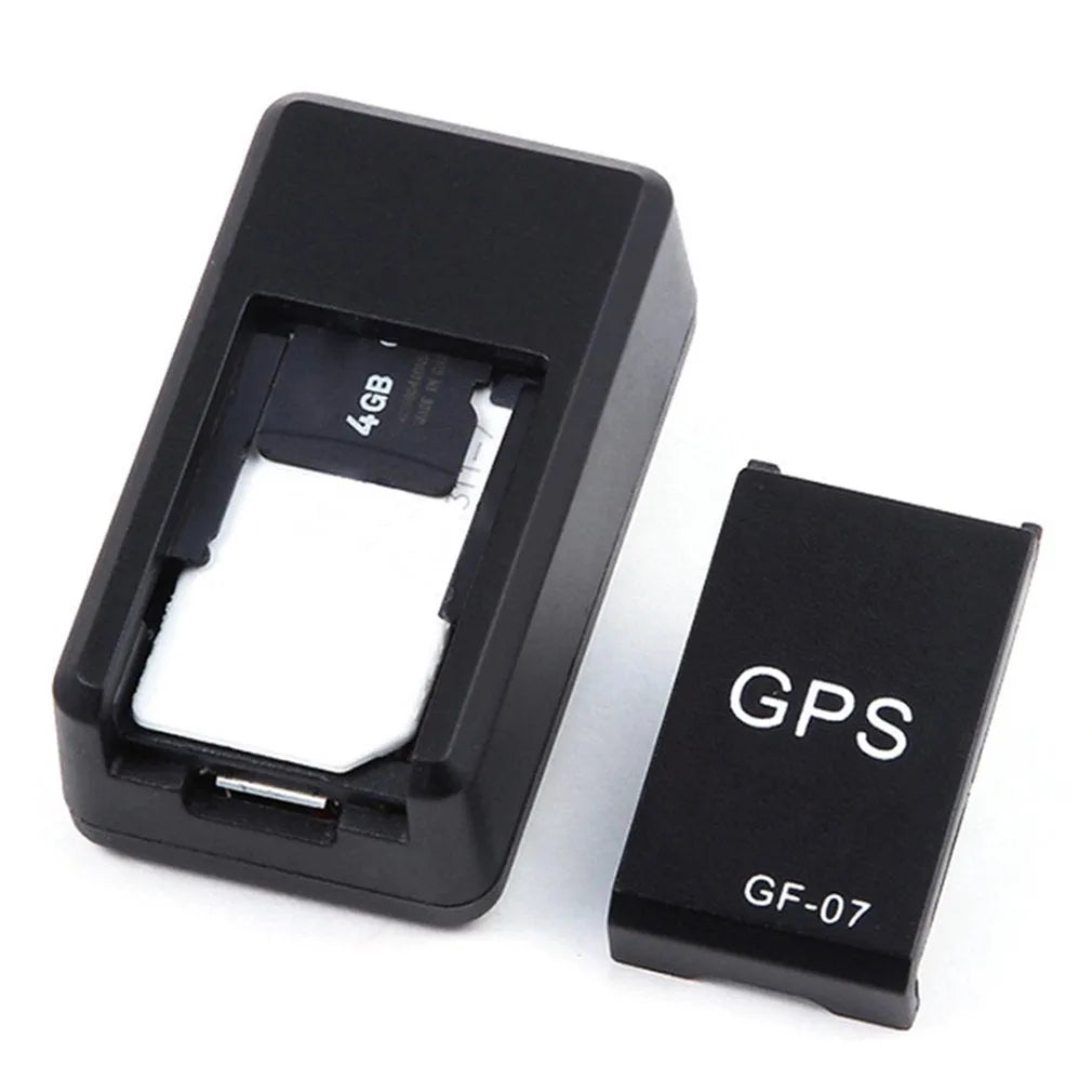 Black mini GPS car tracker device with magnetic mount for vehicle tracking