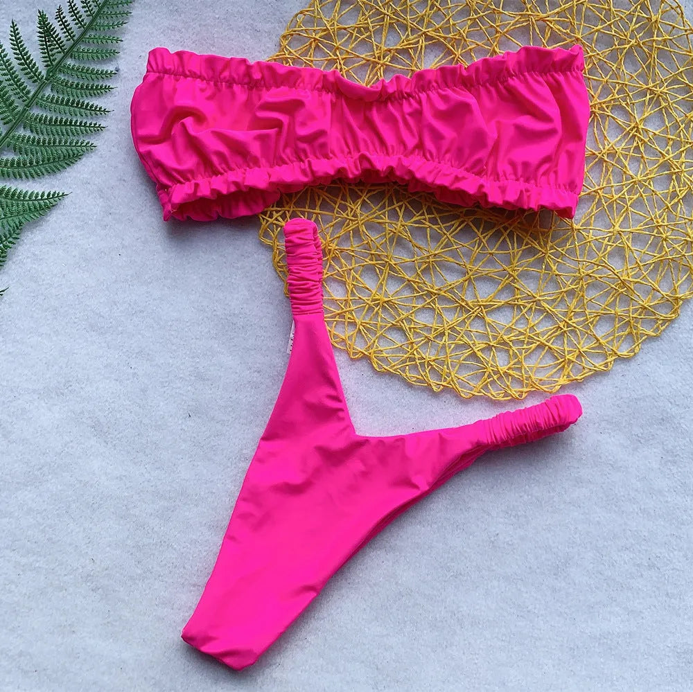 Solid colour women's bikini set in rose red with split chest pad, high waist, and backless design