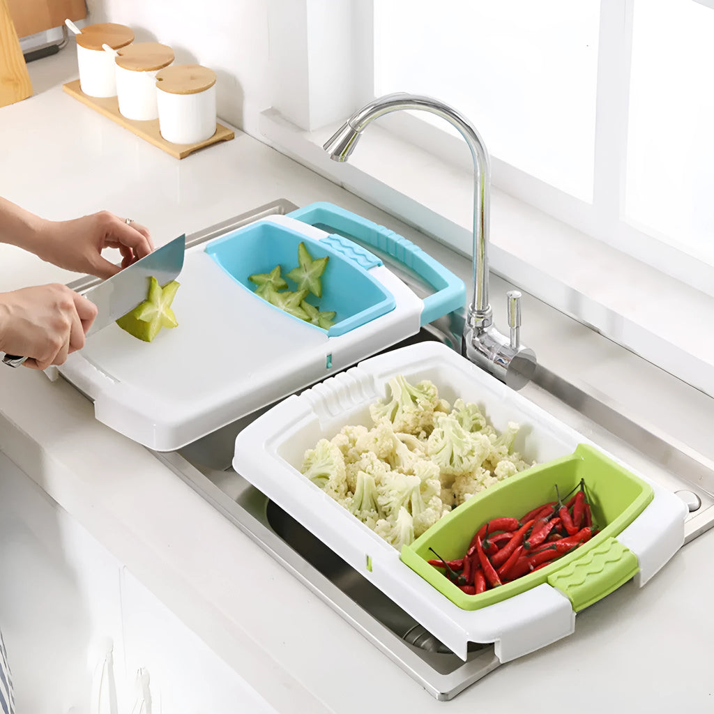 Green multi-function kitchen drain cutting board with storage trough and drainage holes on sink edge