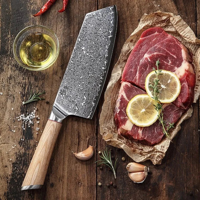 Damascus kitchen knife 7.5 inch blade 67-layer forged stainless steel New Chinese style knife on cutting board