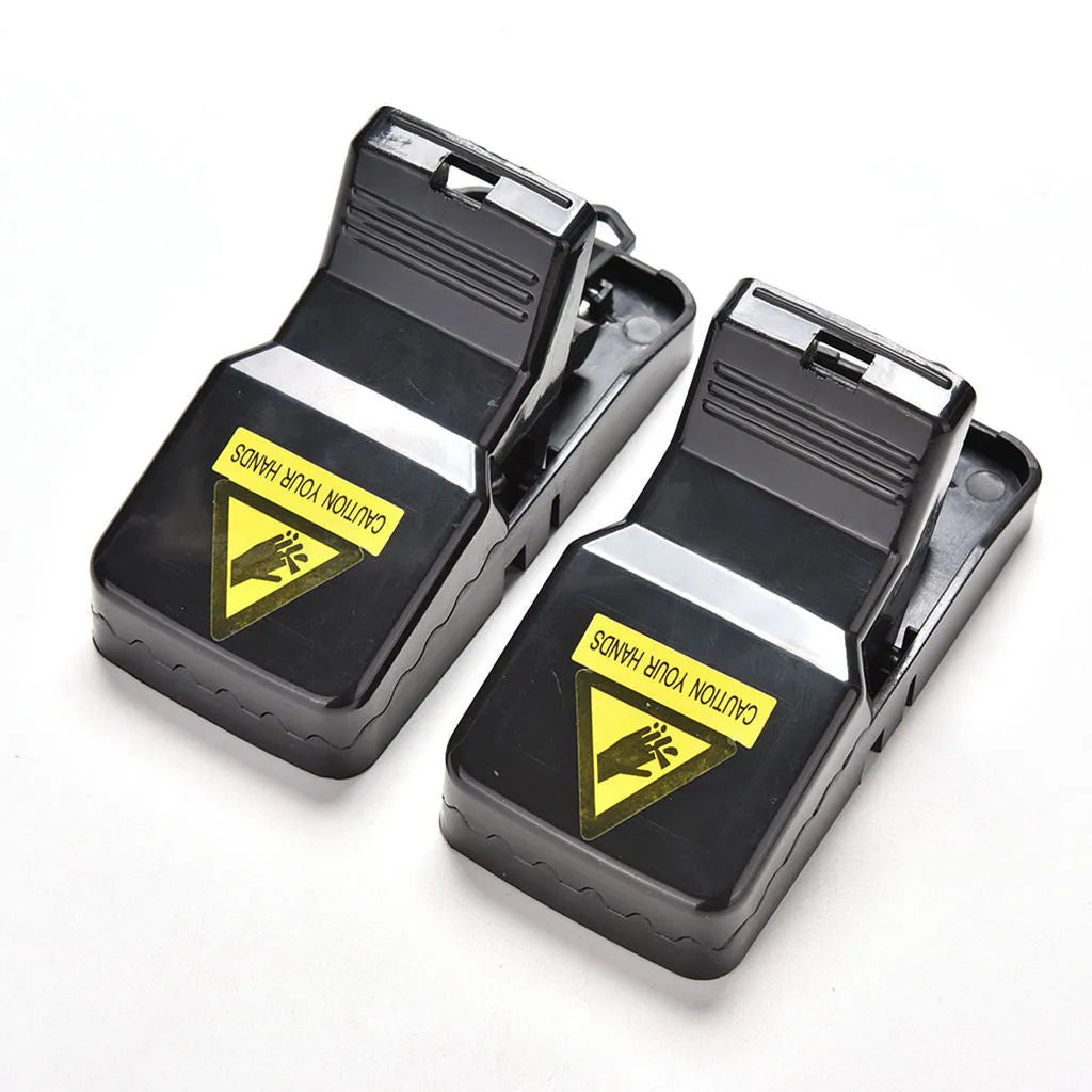 Six black snapping mousetraps made of PC+ABS alloy plastic for rodent control