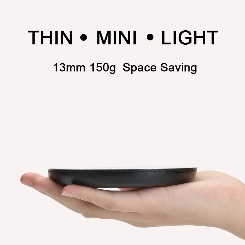 Black cup warmer with tempered glass surface and adjustable temperature control