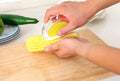 Kitchen Gadgets Peel Corn Separator with plastic shell and wavy stainless steel blade for removing corn kernels from cob