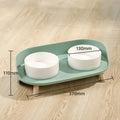 Green tilted double pet bowl set with adjustable angle for cats and small dogs