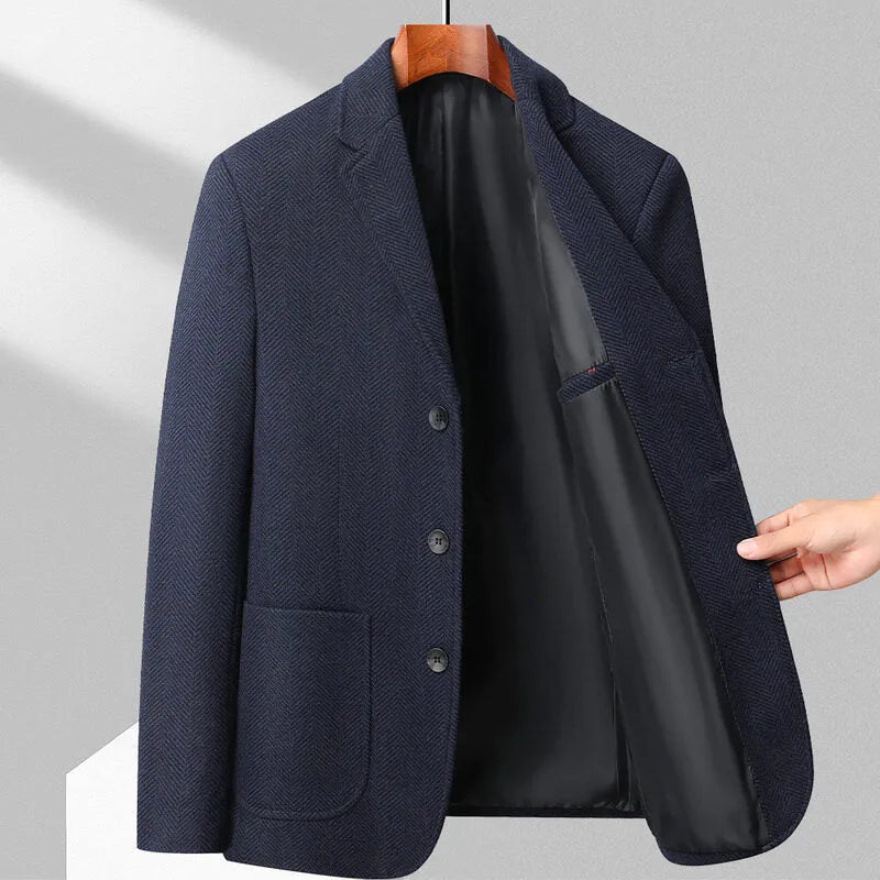 Man wearing a classic loose-fit solid colour woolen coat for spring or autumn.