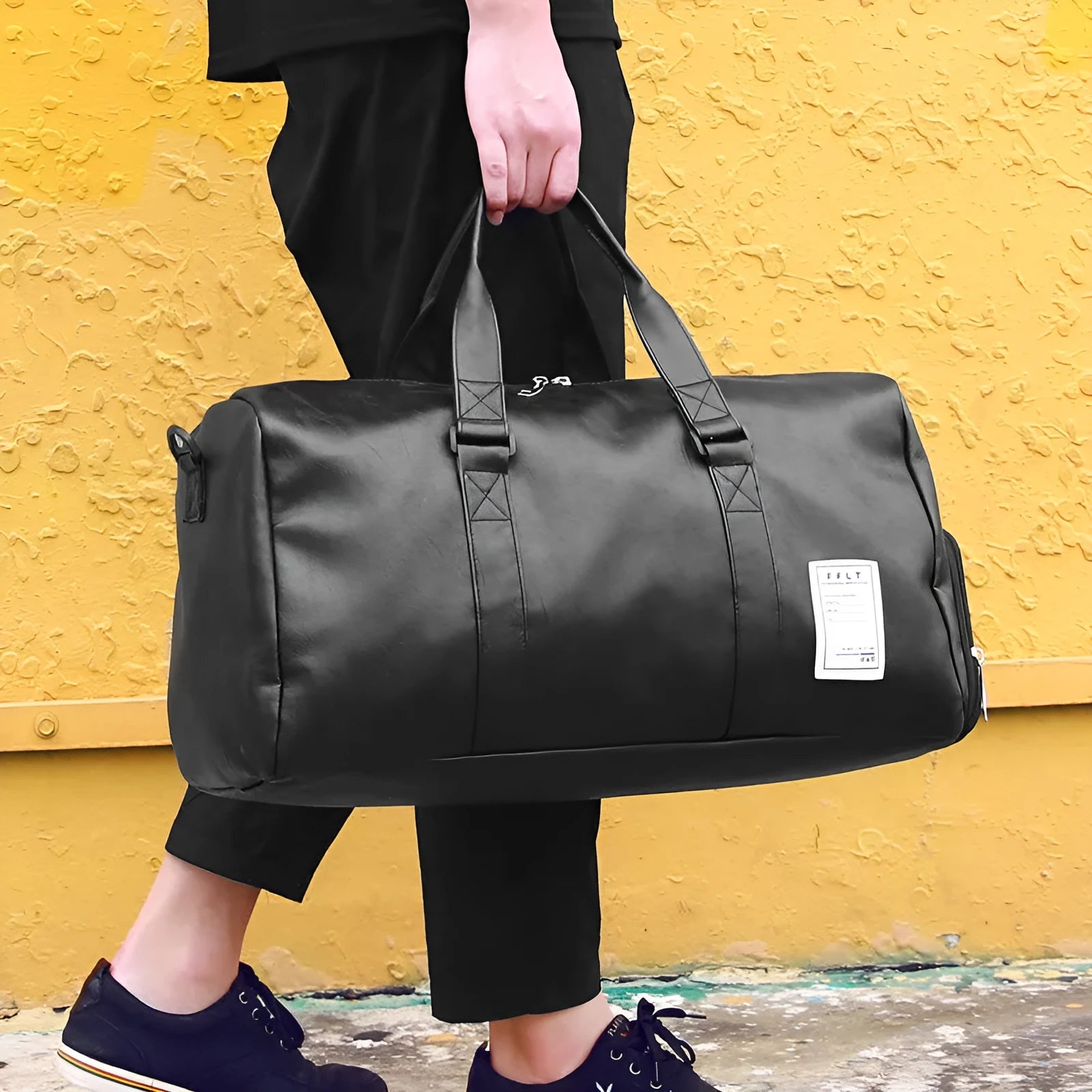 Black waterproof sports bag with separate shoe compartments shown in Large and Small sizes.