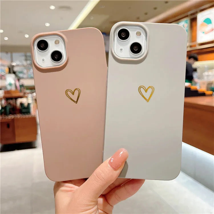 Simple cute grey silicone iPhone case with hot stamping design on a table.