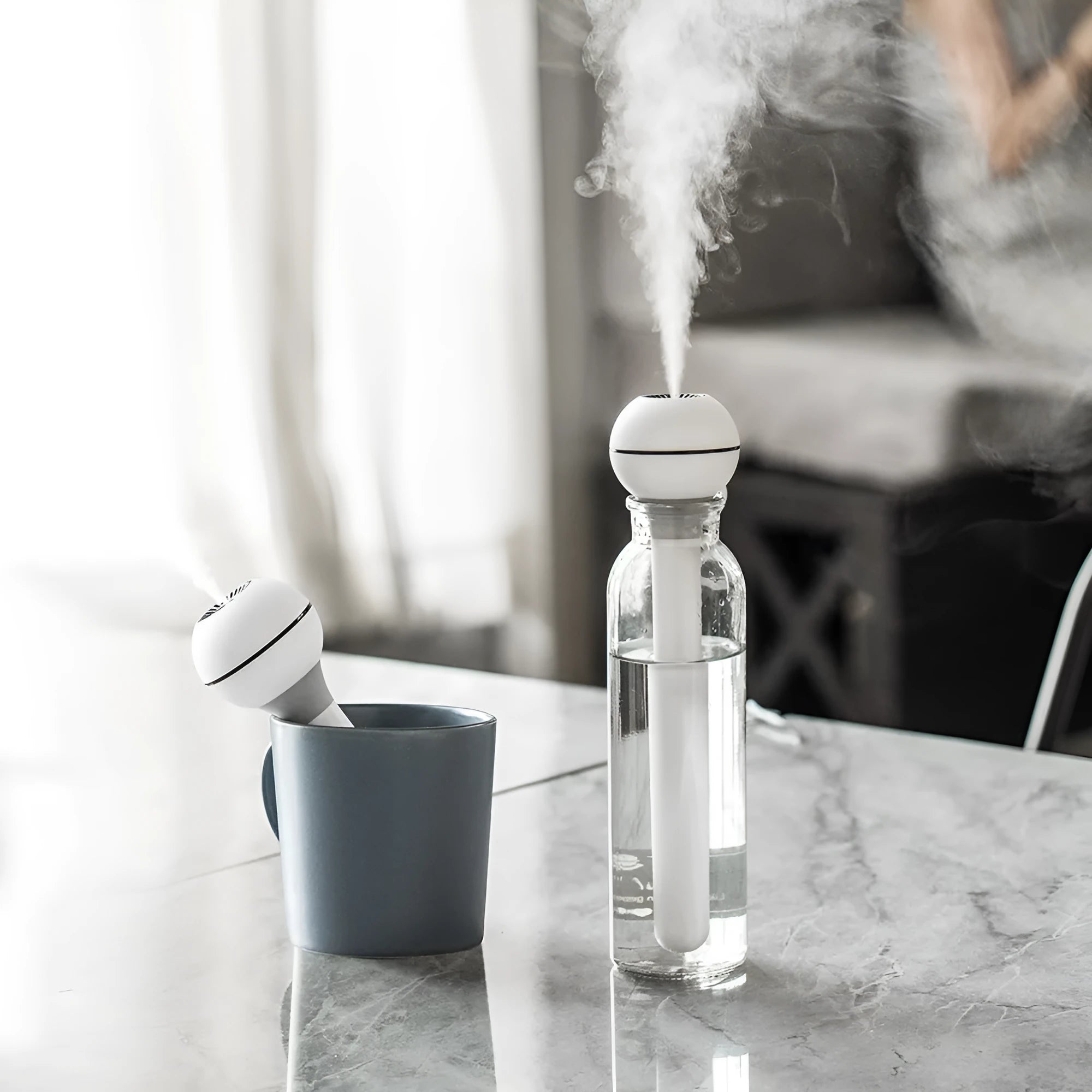 Columnar magic wand ultrasonic humidifier in pink or white with USB power cable