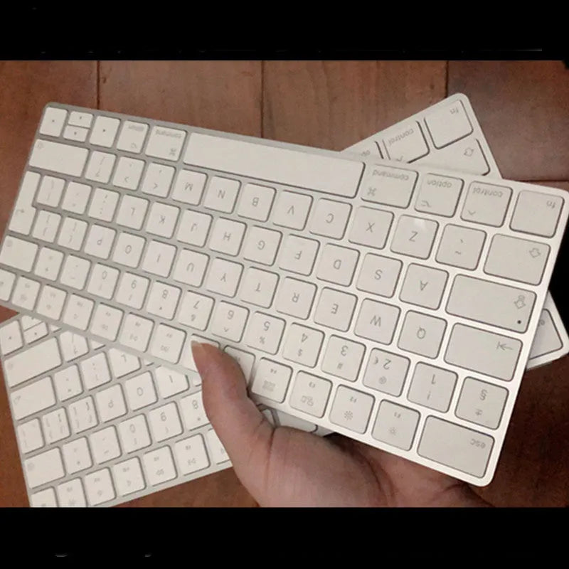 White Apple Bluetooth wireless keyboard with aluminium case and multimedia function keys
