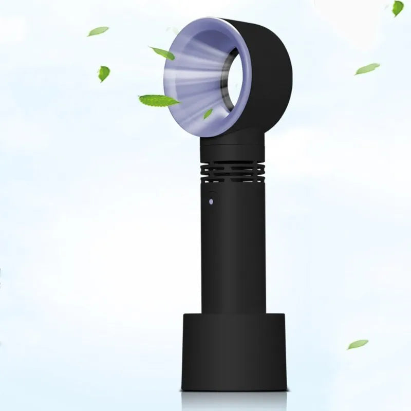 Portable bladeless fan in white with USB charging cable, base, and three speed settings