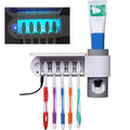 White ABS 3-in-1 toothbrush holder with UV steriliser and toothpaste dispenser, wall mounted with five slots
