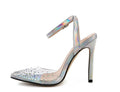 Women's pointed toe diamond sandals with a stiletto heel and PVC upper.