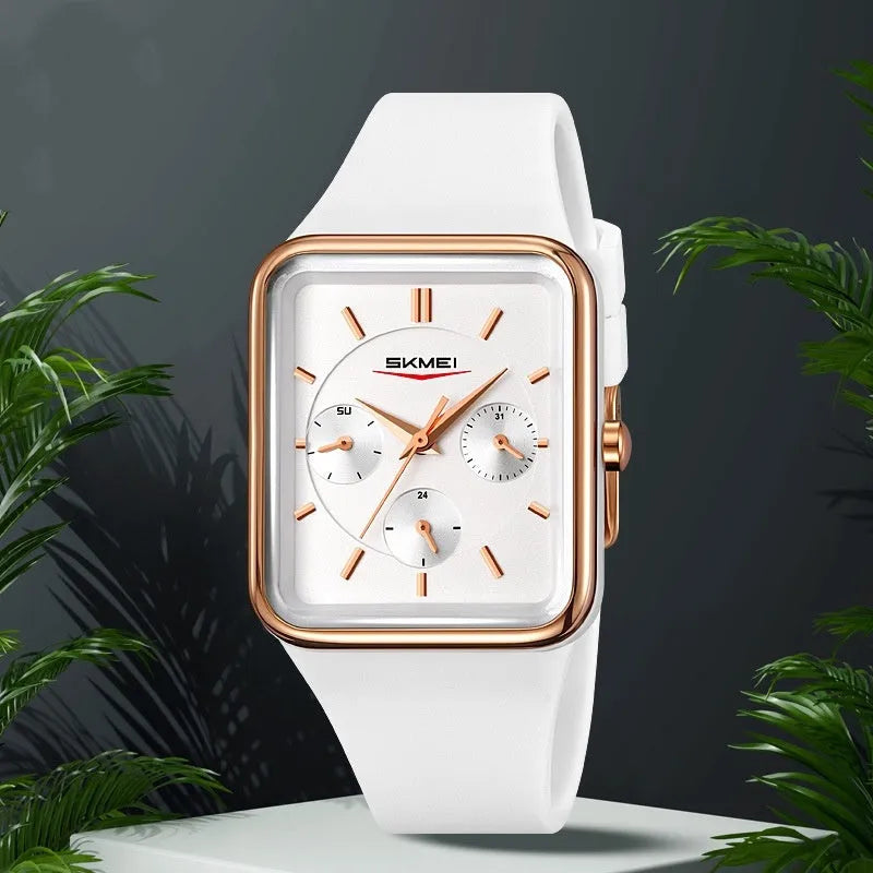 Multi functional square silicone waterproof watch for women, black gold colour, on wrist