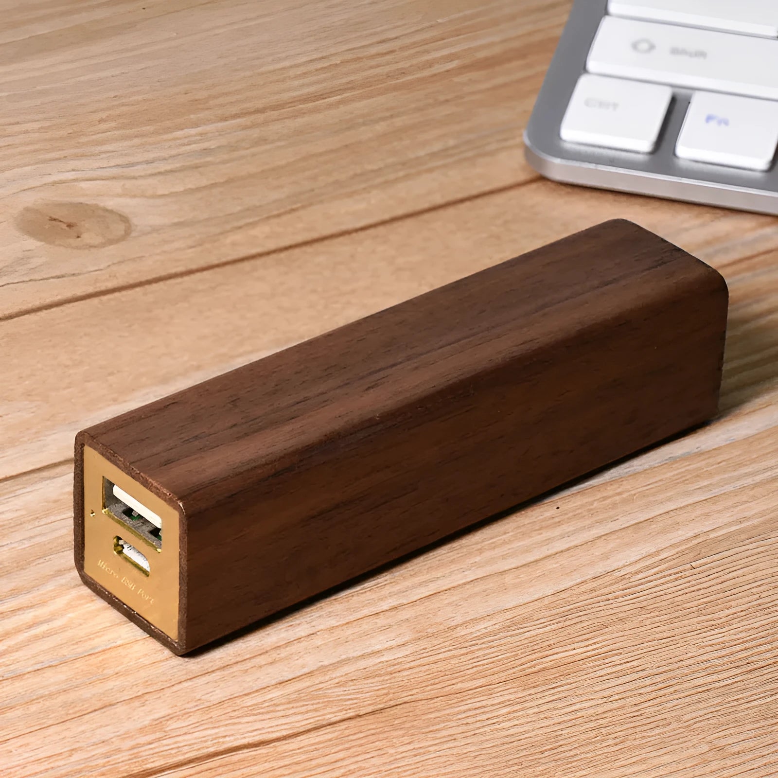 Portable black walnut solid wood power bank with 2000mAh capacity, brown colour, 100mm cylindrical design