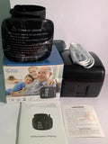 Black digital wrist blood pressure monitor with USB charging port and multi-language voice function.