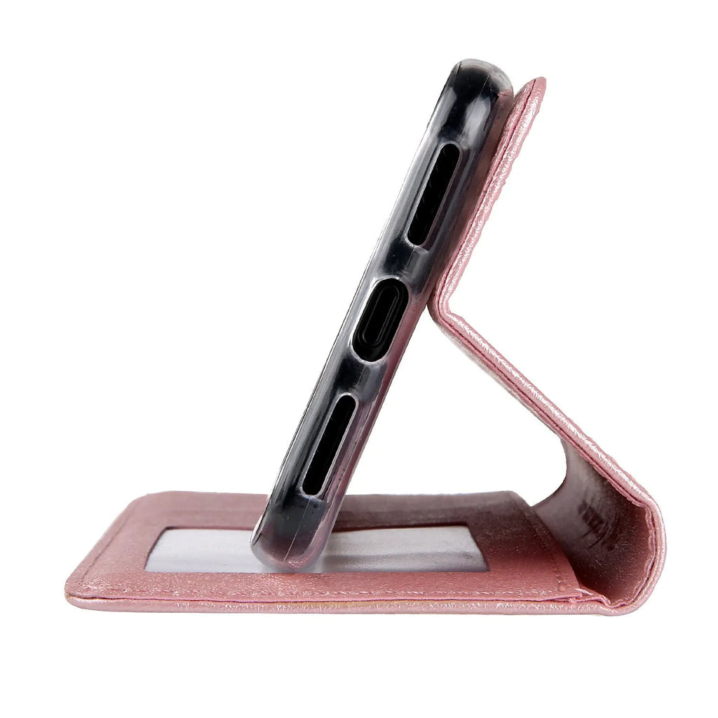 Flip phone case for Apple iPhone with card slot in Black, showing front cover and spine