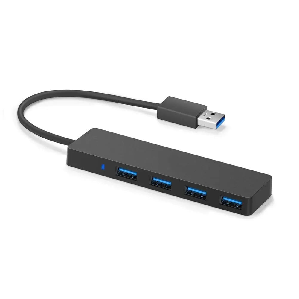 USB 3.0 hub splitter with 4 ports and black LED indicators on a desk