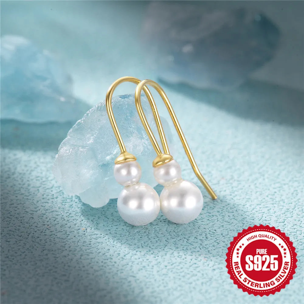S925 sterling silver women's earrings with geometric sunflower design and golden-three diamonds zircon stones.