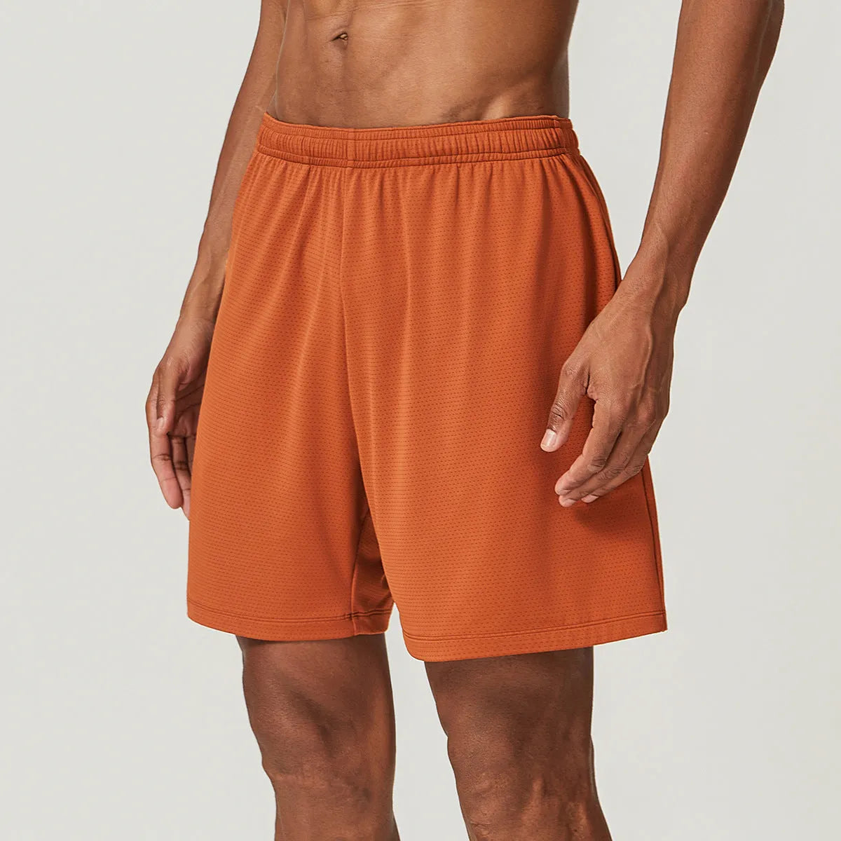 Men's quick-dry double-layer running shorts in multiple colours on a size chart.