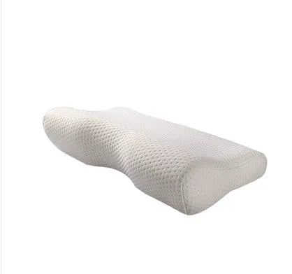 Cervical pillow with memory cotton and butterfly shape in blue, 50x30cm size, on a bed