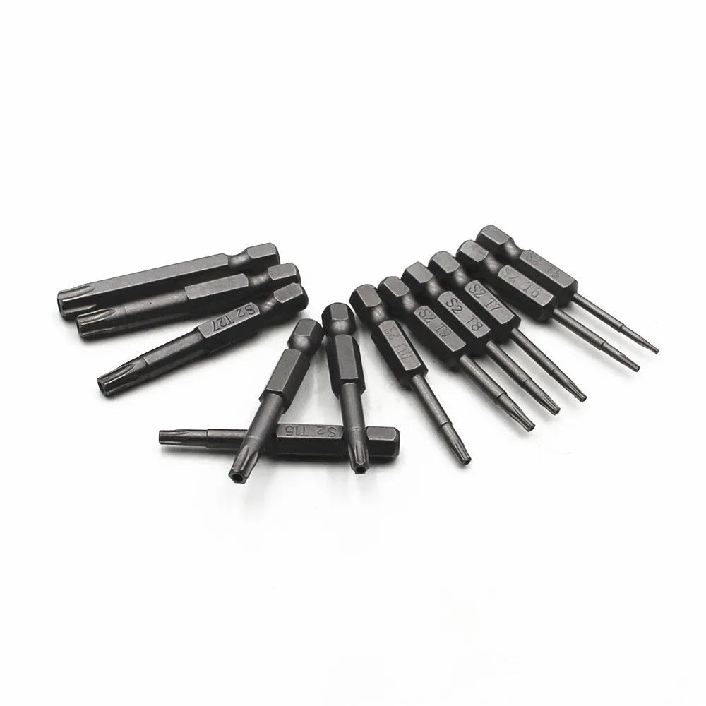 Alloy hexagon handle screwdriver bit set with plum blossom hollow bits in 50mm, 75mm, and 100mm lengths on a workbench