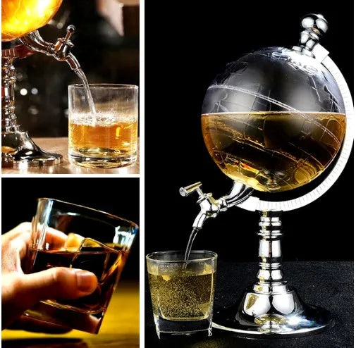 Transparent globe wine decanter dispenser with silver chrome stand and plastic body on a table