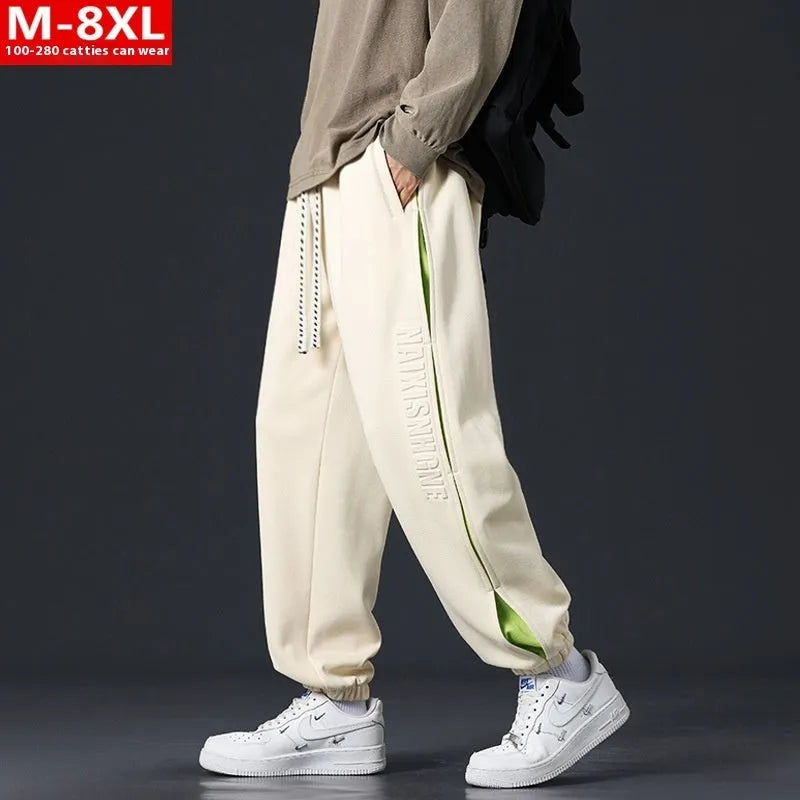 Men's cotton ankle banded pants with collage stitching printing in loose fit design