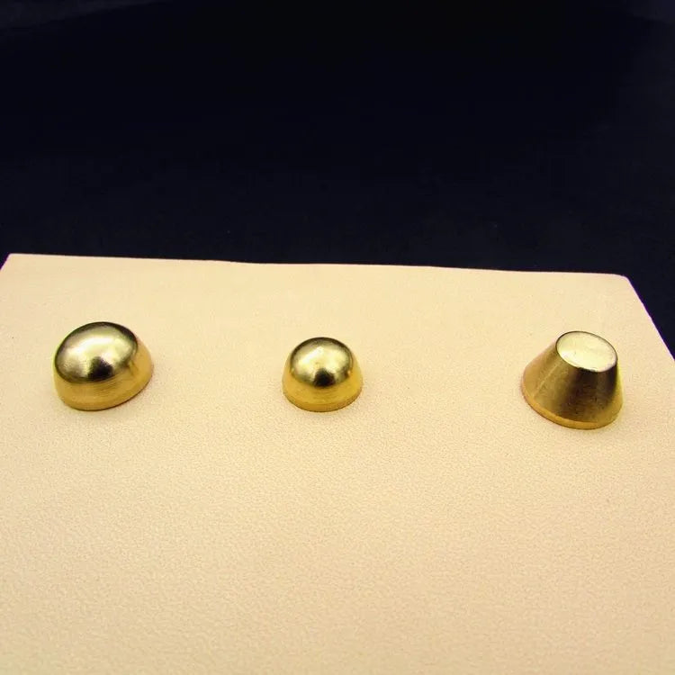 Brass decorative buckle with antique foot nail design in four size variations