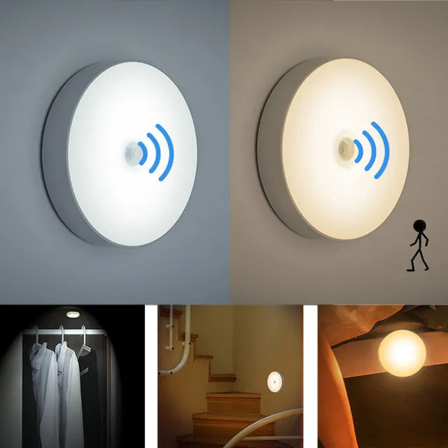 Small round white LED night light with motion sensor, shown with USB charging cable and adhesive tape.