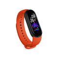 M5 model smart fitness bracelet in black, showing the 0.96-inch touch screen displaying a heart rate reading.