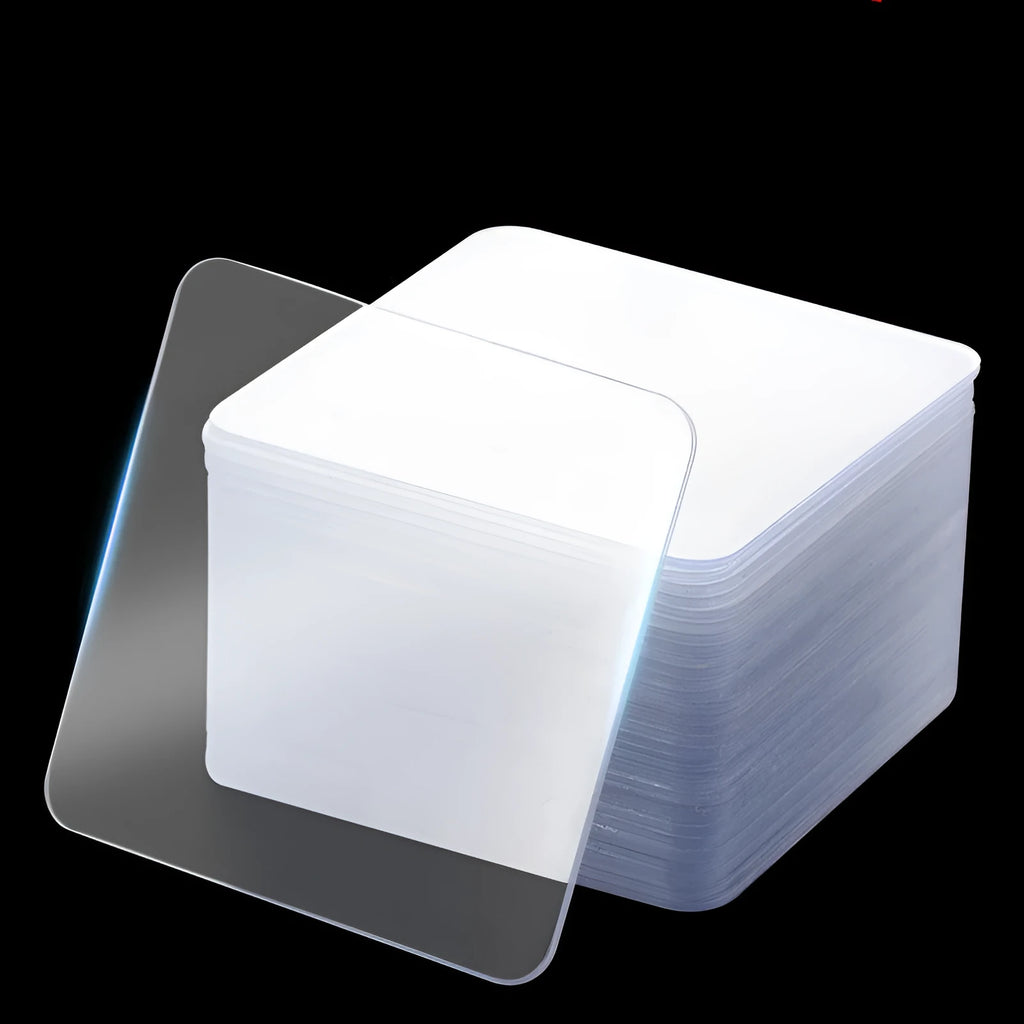 10 transparent nano double-sided stickers 6cm by 6cm on a white background