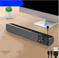 Black and white desktop computer speaker with 2.0 channel stereo and Bluetooth or wired connectivity