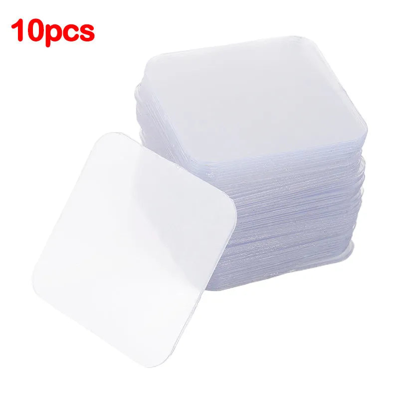 10 transparent nano double-sided stickers 6cm by 6cm on a white background