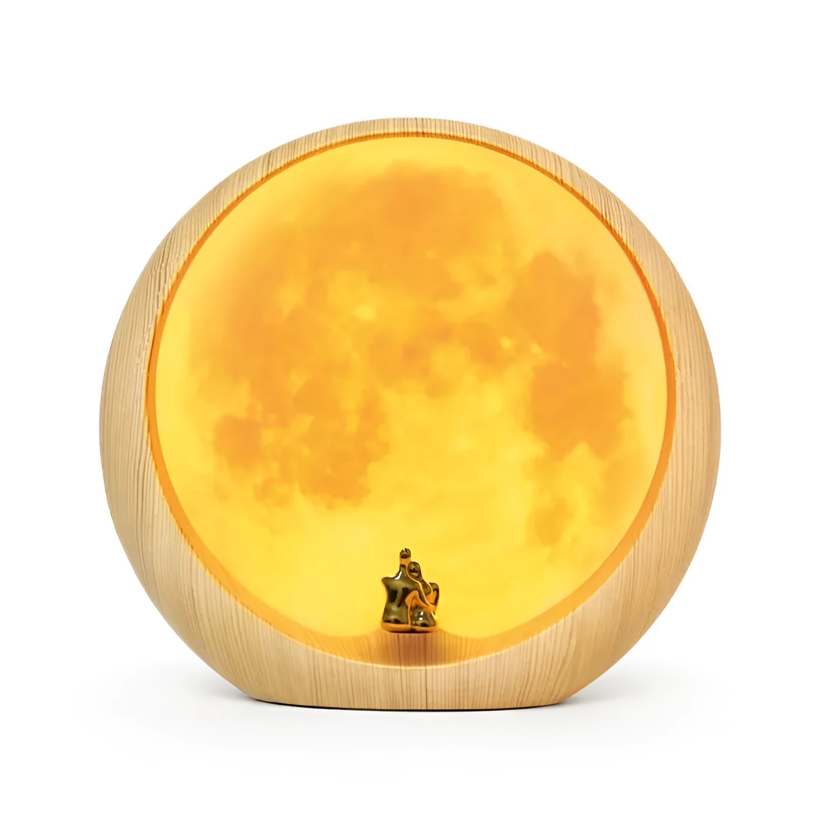 Creative hidden moon light LED touch lamp with ABS shade in blue on a wooden bedside table
