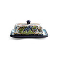 Square ceramic butter box with lid in white, underglaze flower pattern, on kitchen counter