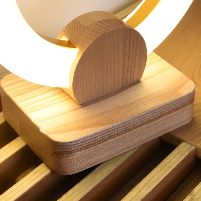 Modern wooden circular art chandelier with acrylic shade, shown in 20cm and 30cm diameter options
