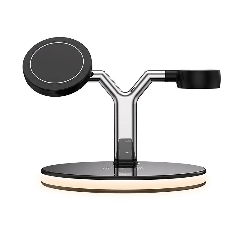 Black 15W three-in-one magnetic wireless charger on a desk with a smartphone placed on the charging pad