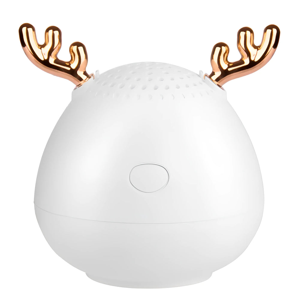 Compact Bluetooth speaker in white, pink, and green, 75x88mm, with USB cable
