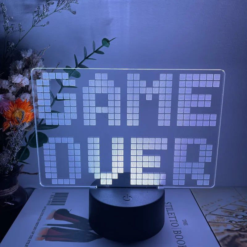Creative Gamepad 3DLED Desk Lamp with acrylic shade and USB cable on desk