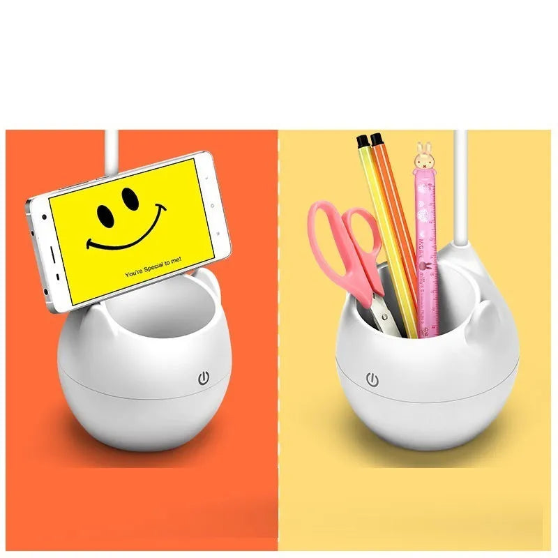 Clip-on LED rechargeable desk lamp with pen holder on a wooden desk, adjustable brightness for studying