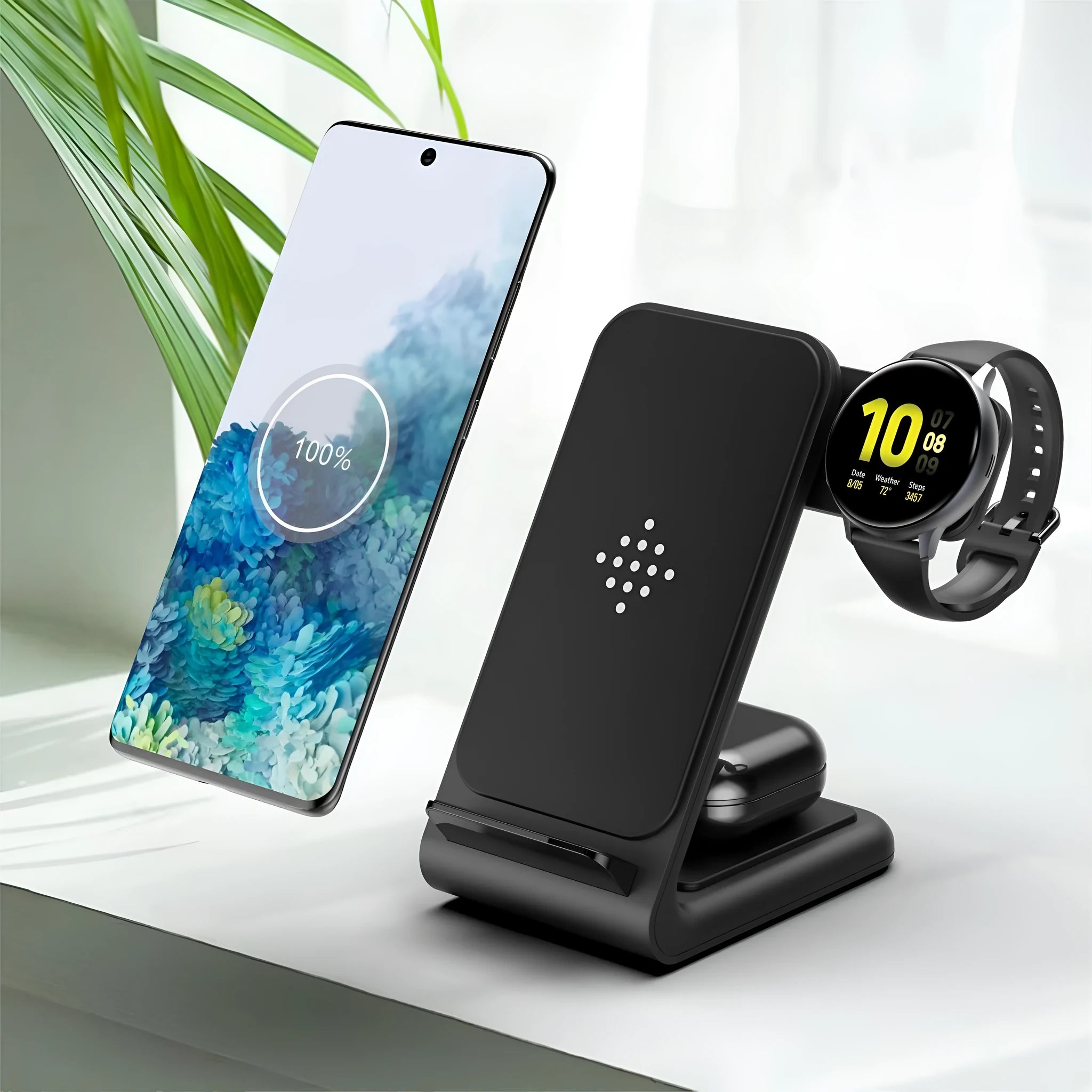 Three-in-one fast wireless charger bracket in black ABS and silicone, holding a phone, smartwatch, and TWS earbuds