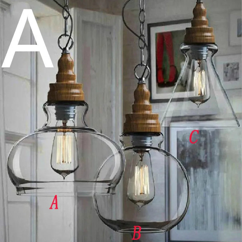 Glass wood grain single head pendant light hanging on an adjustable cord.