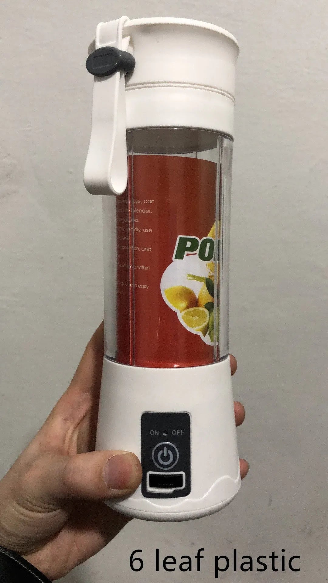 Mini USB electric centrifugal juicer with stainless steel blade, anti-slip base, and rope handle in blue plastic housing