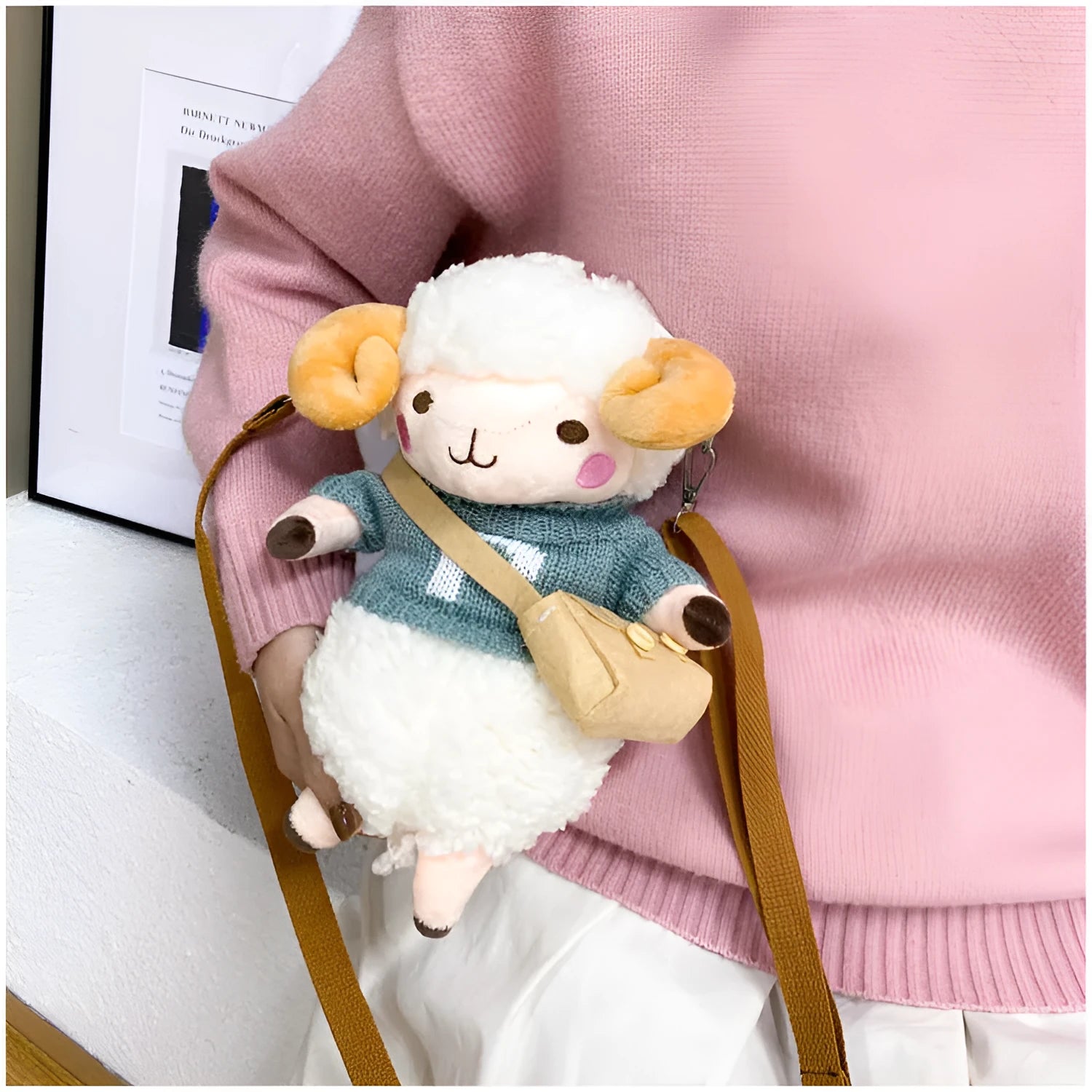 Little Sheep plush crossbody bag showing square shape, zipper opening, and colour contrast details