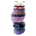 Purple fluorite carved owl ornament showing detailed hand-carved features and natural crystal texture