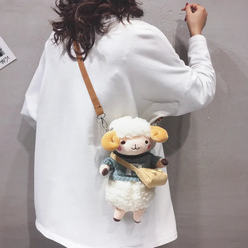 Little Sheep plush crossbody bag showing square shape, zipper opening, and colour contrast details