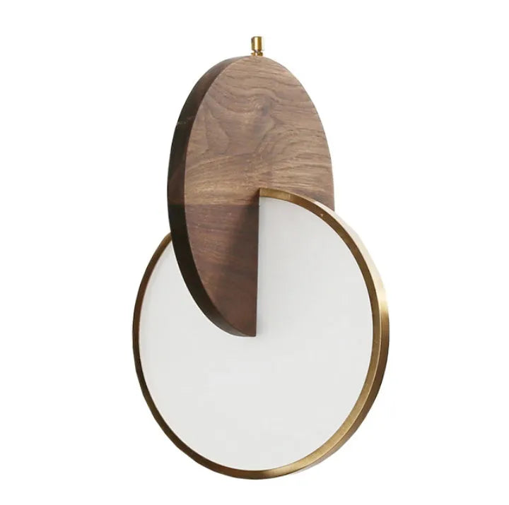 Long-line walnut wood chandelier with carved detailing and warm white lighting