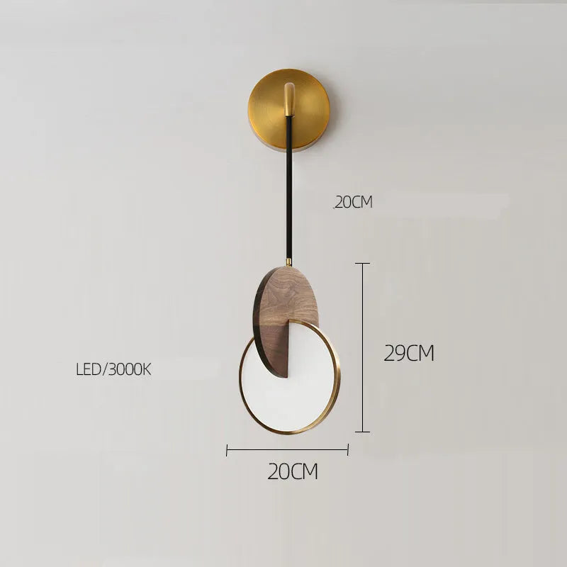 Long-line walnut wood chandelier with carved detailing and warm white lighting